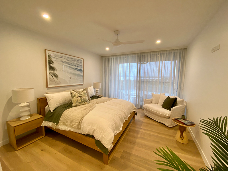 Modern white bedroom with white curtains