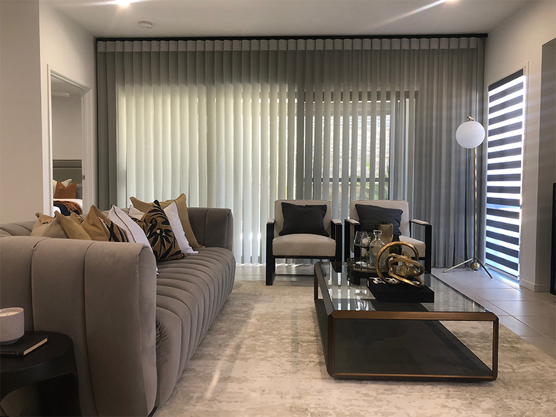 Long blinds in modern living area