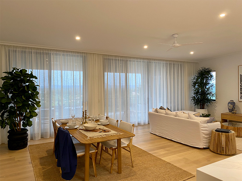 Living area with white curtains