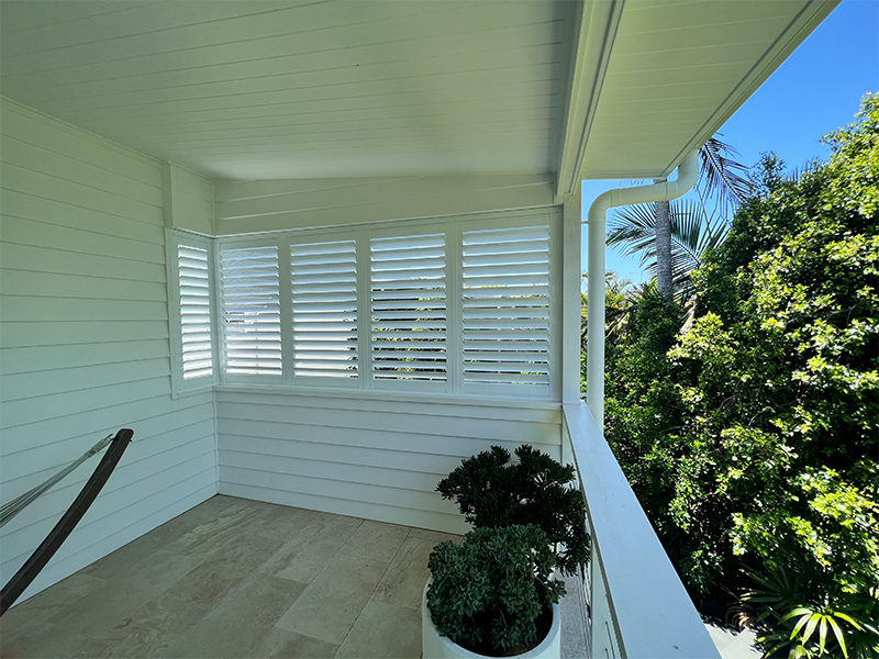 Bespoke white wooden shutters