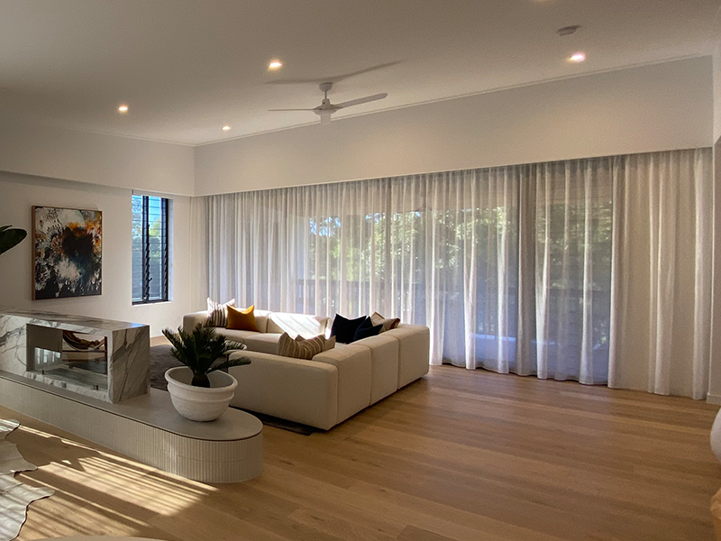 Living room with white curtains