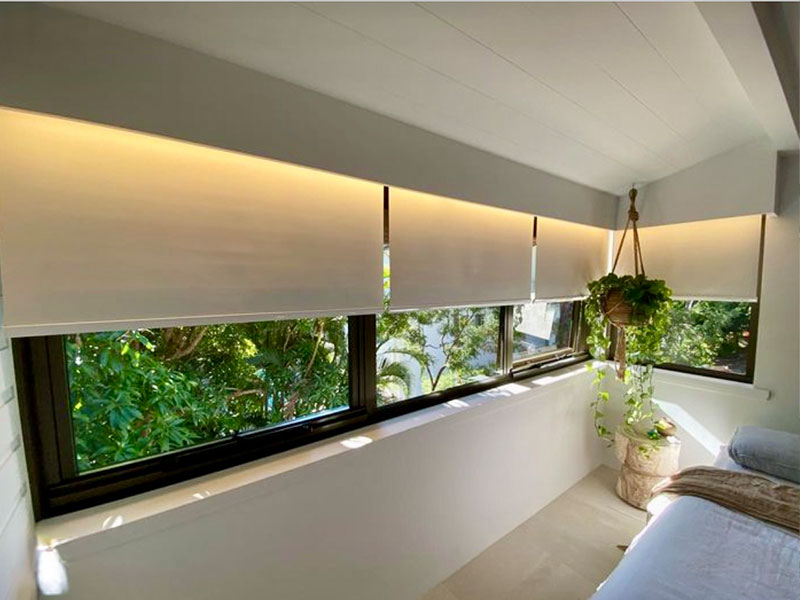 White blinds in sunlit room