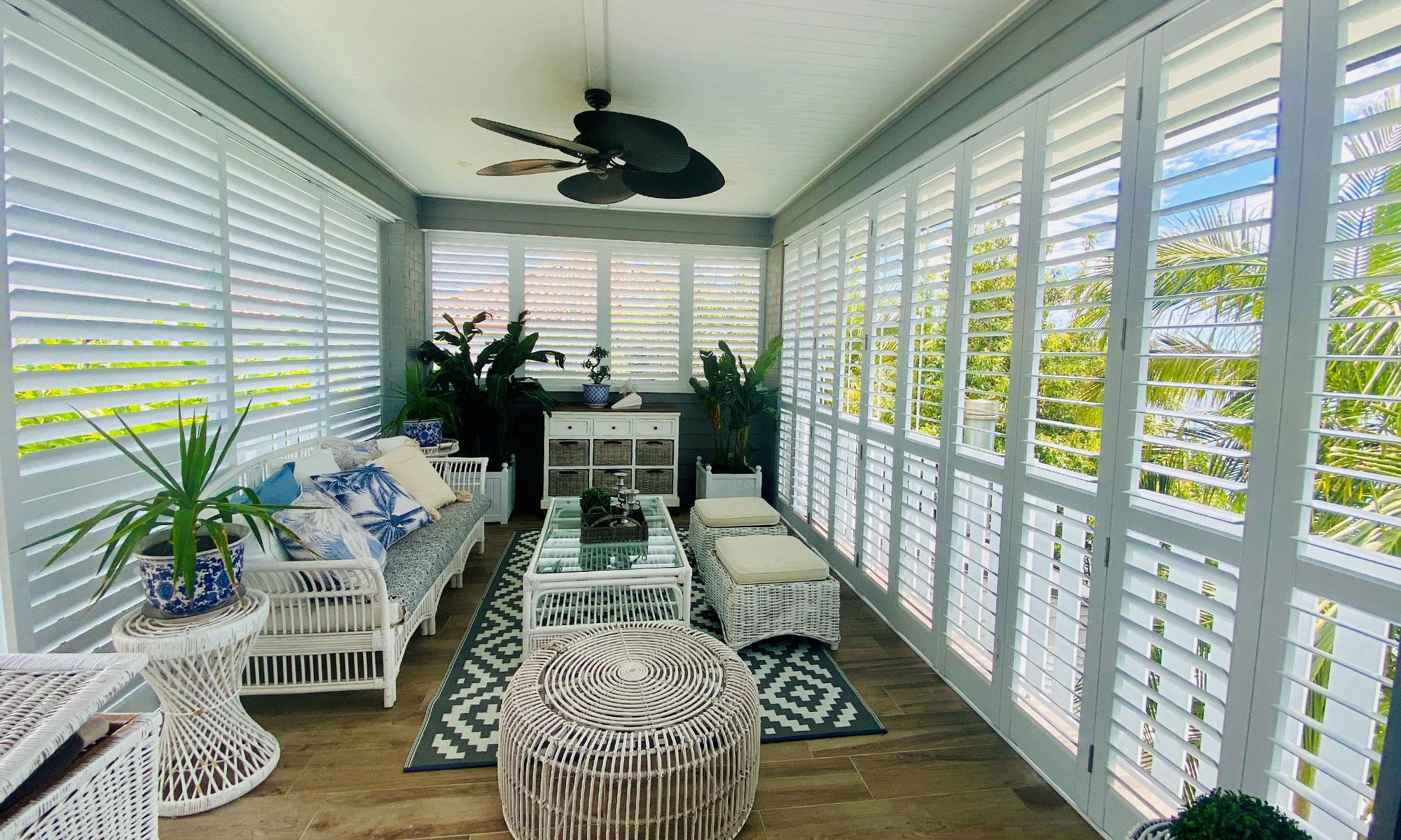 Outdoor area with white plantation shutters