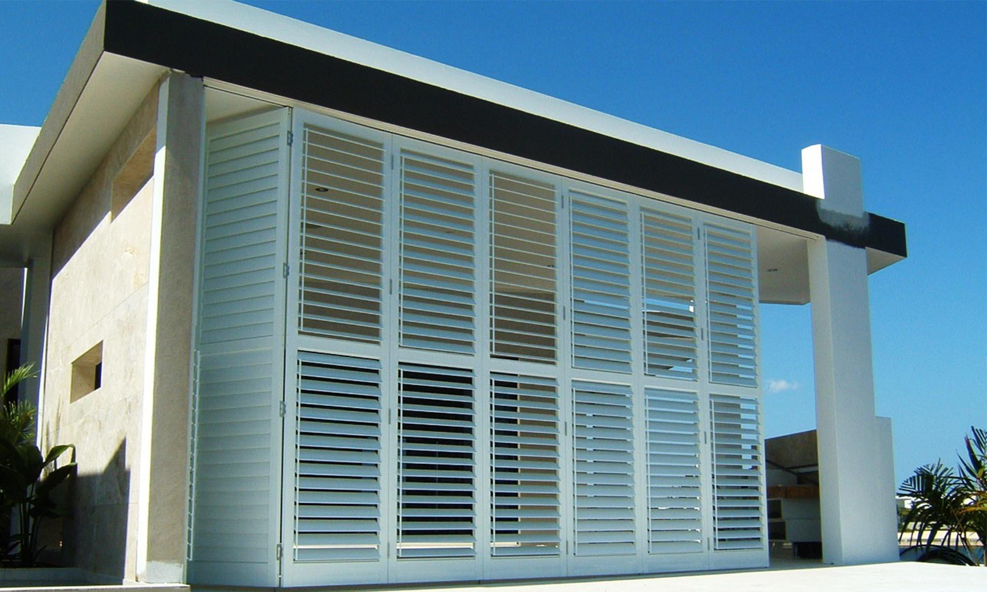 Large white building with shutters